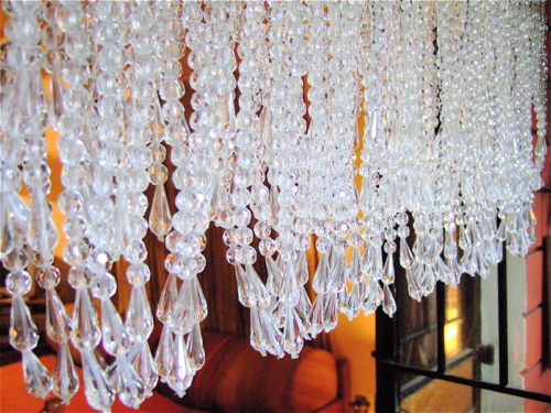 short white beads curtain for doorway arch